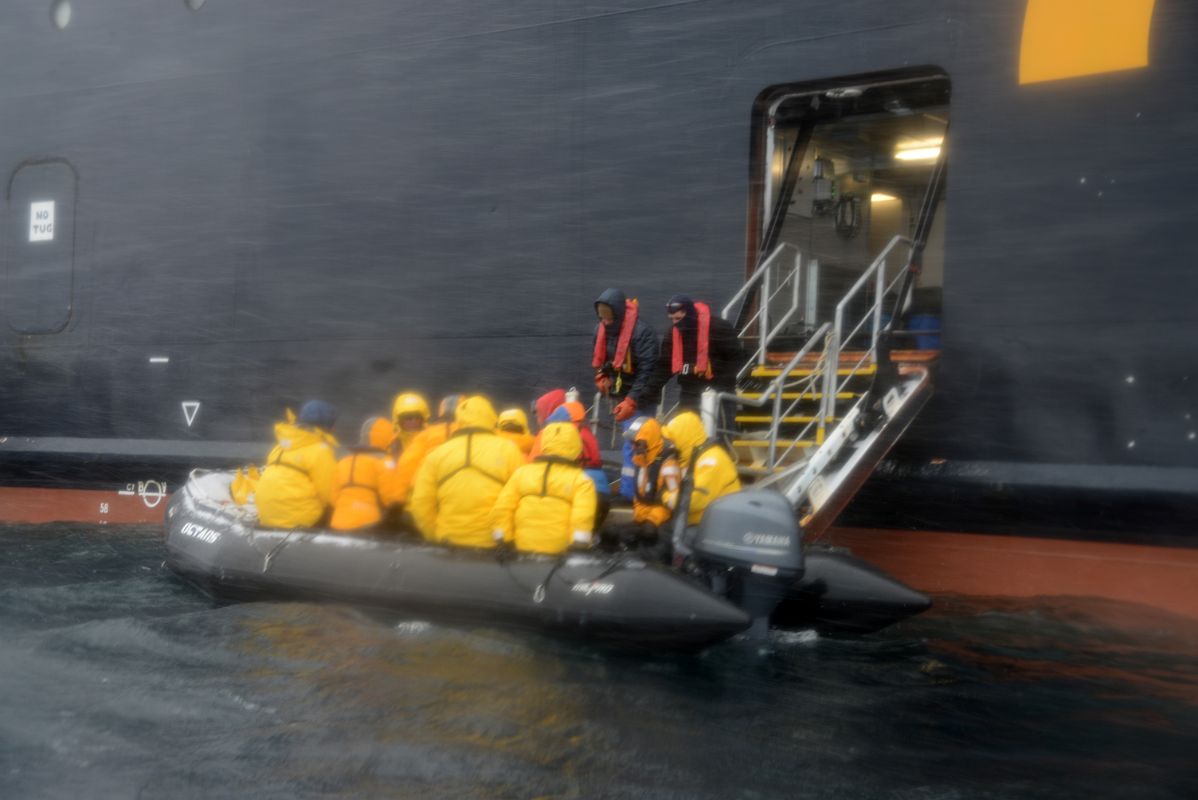 01A Boarding Zodiac In Bad Weather From Cruise Ship In Foyn Harbour On Quark Expeditions Antarctica Cruise